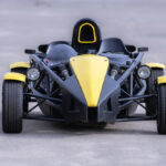 Ariel Atom sports car, showcasing its unique, skeletal frame and minimalistic design that emphasizes functionality and speed, making it an ideal choice for high-adrenaline driving experiences.